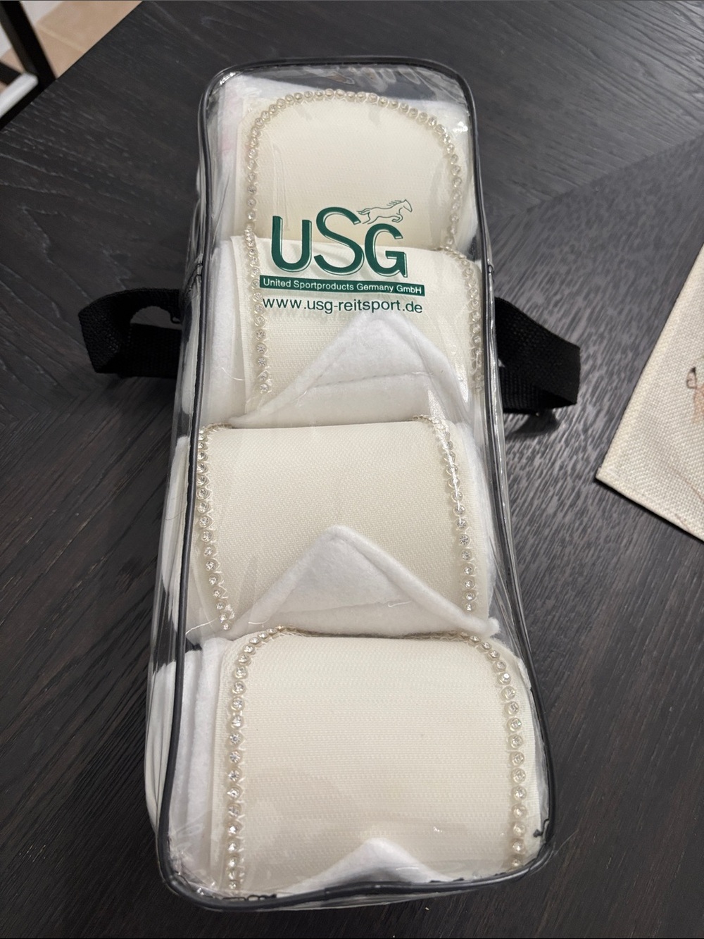 USG white bling polo wraps. Brand new with tags.